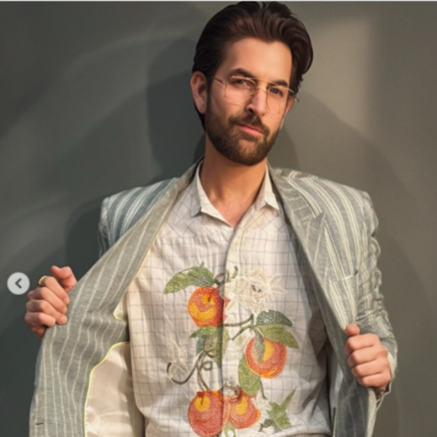 NEIL NITIN MUKESH WEARING FIG SUN IN GOLD/LIGHT PINK