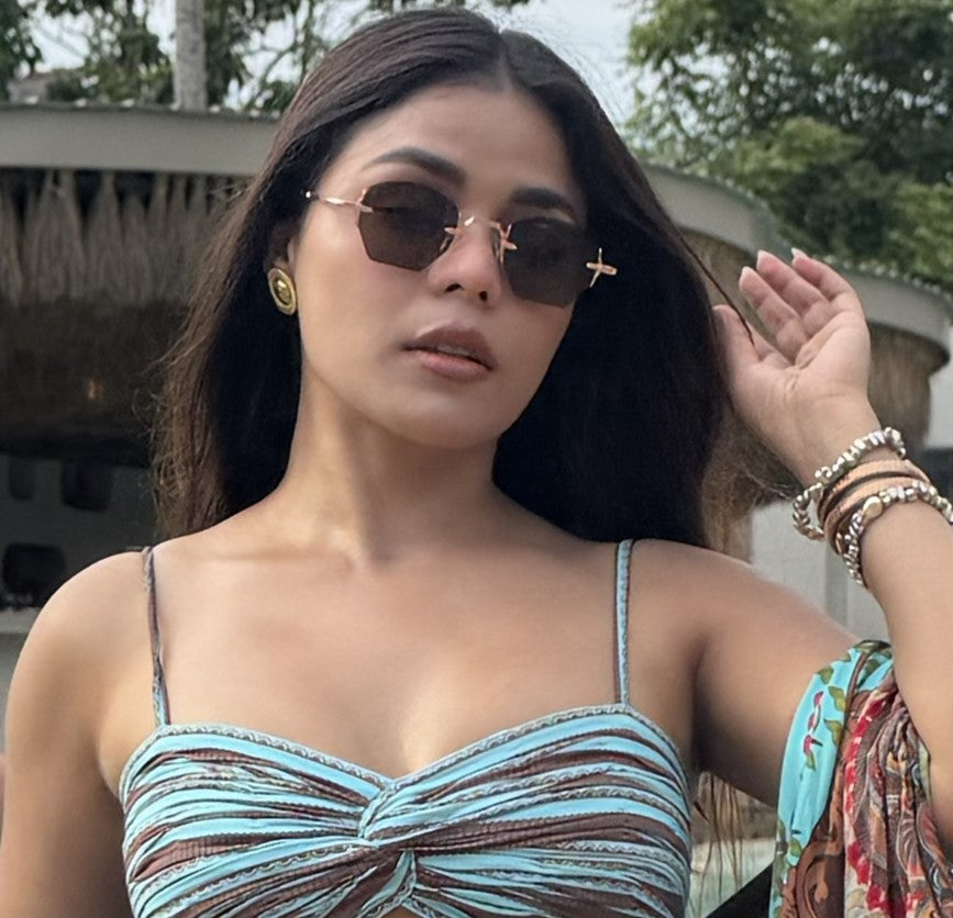 MONICA D'SOUZA WEARING CORTEZ SUN IN ROSE GOLD/ LIGHT  BROWN