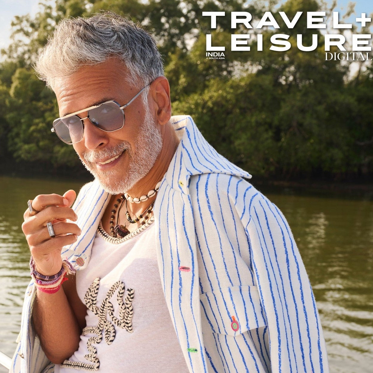 MILIND SOMAN WEARING EDDY SUN IN GREY/ BLUE GRADIENT