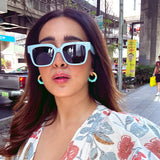 SANJANA BATRA WEARING BRANDON SUN IN GLACIER BLUE/GREY